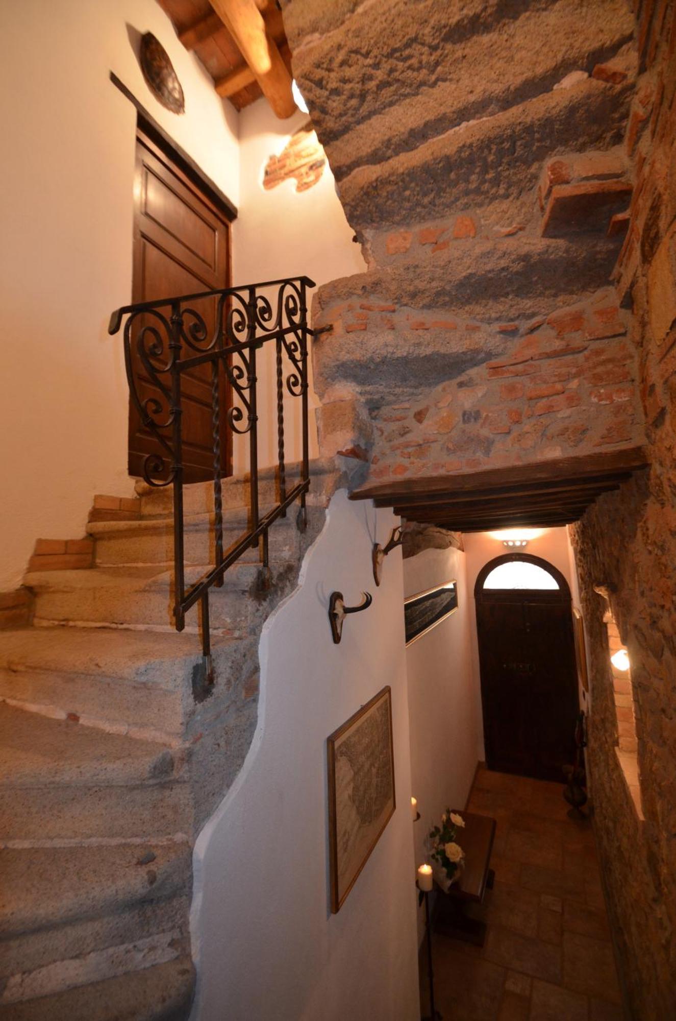 Апартаменты La Divina Dimora Il Castello Degli Spiriti Magni Montepescali Номер фото