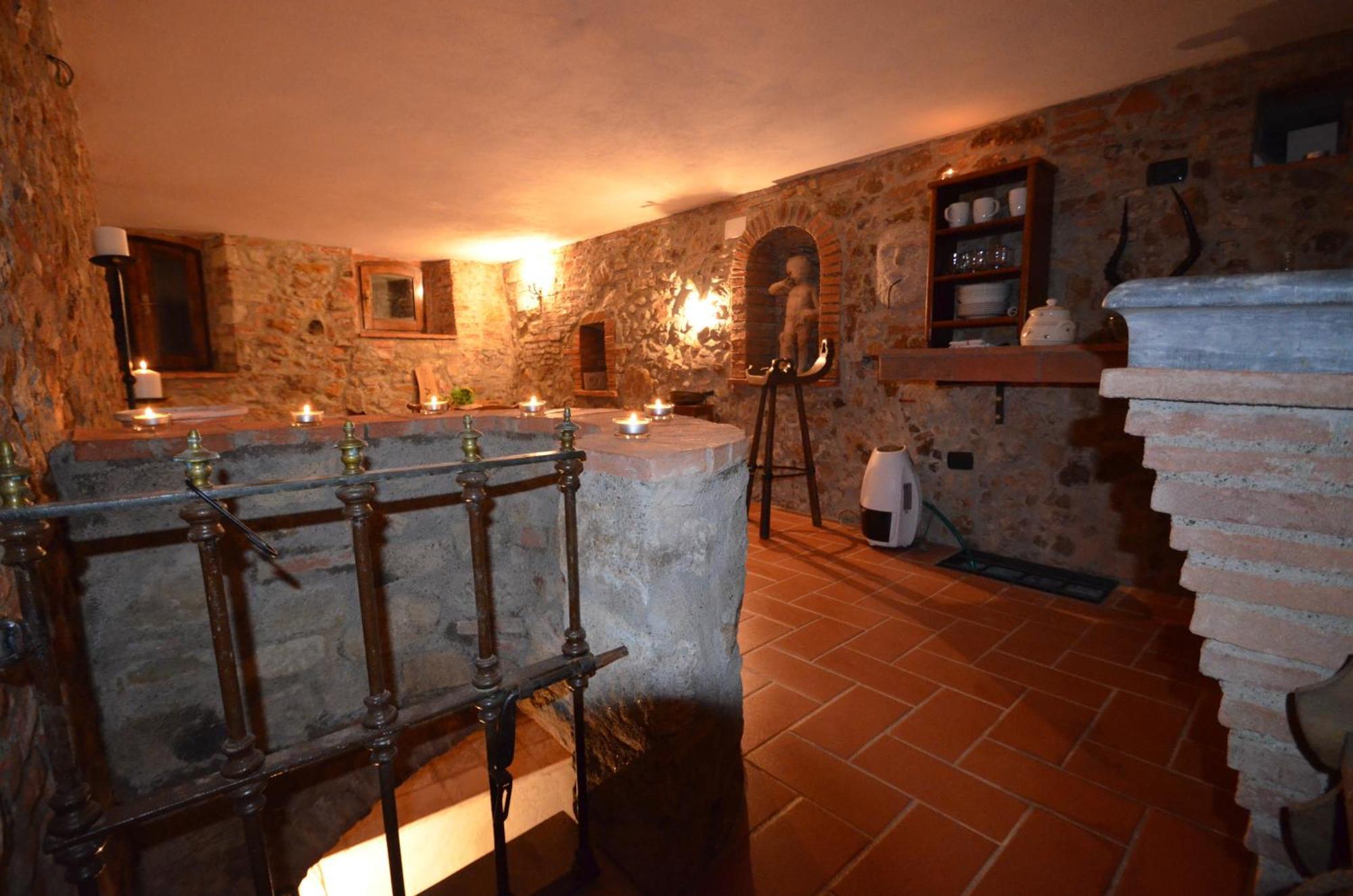 Апартаменты La Divina Dimora Il Castello Degli Spiriti Magni Montepescali Номер фото